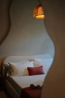 Letto o letti in una camera di Taga Suites