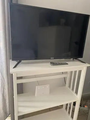 TV o dispositivi per l'intrattenimento presso Vacanza a Catania House