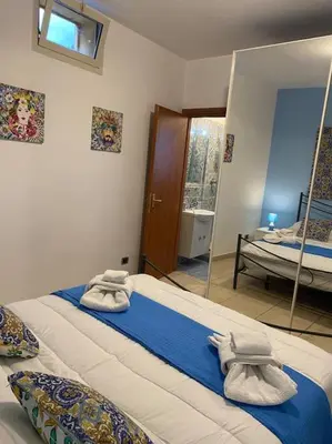 Letto o letti in una camera di Vacanza a Catania House