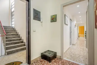 TV o dispositivi per l'intrattenimento presso GuestHost - Charming Apartment Near Villa Bellini in Catania