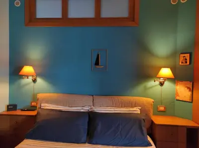 Letto o letti in una camera di Casa Sul Golfo di Ognina