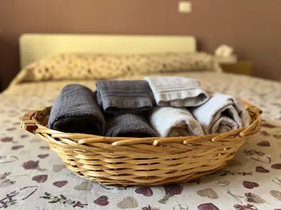 Letto o letti in una camera di B&B La Rosa dell'Etna - Appartamento completo