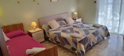 Letto o letti in una camera di A casa di Naty