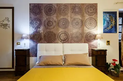 Letto o letti in una camera di Villa Rubino