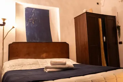 Letto o letti in una camera di La casa di Giordana, centro storico