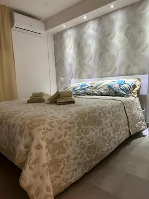Letto o letti in una camera di Dante Home