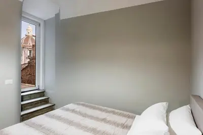 Letto o letti in una camera di Casa Penninello
