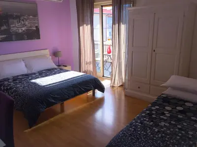 Letto o letti in una camera di Policlinico Apartments