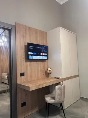 TV o dispositivi per l'intrattenimento presso Karma6Rooms - in Sicilia nel centro di Catania