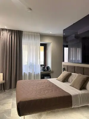 Letto o letti in una camera di Karma6Rooms - in Sicilia nel centro di Catania