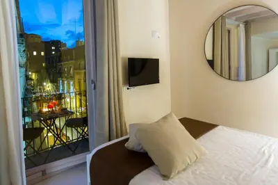 Letto o letti in una camera di Stesicoro Exclusive House