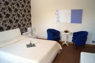 Letto o letti in una camera di Baia Di Ognina