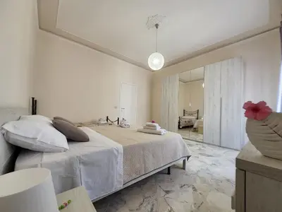 Letto o letti in una camera di IL SOLE SUL MARE a 100 m dal lungomare di Stazzo