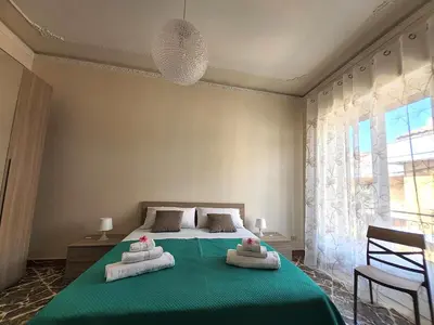 Letto o letti in una camera di IL SOLE SUL MARE a 100 m dal lungomare di Stazzo