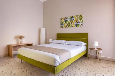 Letto o letti in una camera di San Vito Home