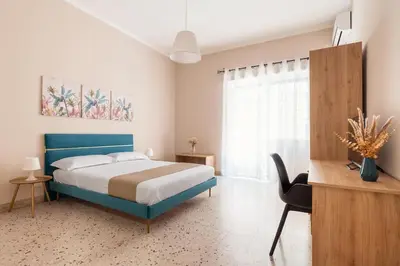 Letto o letti in una camera di San Vito Home