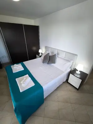 Letto o letti in una camera di Rifugio del sole House