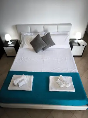 Letto o letti in una camera di Rifugio del sole House