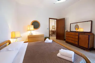 Letto o letti in una camera di Elegante Villa con Giardino tra Catania ed Etna