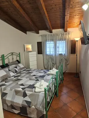 Letto o letti in una camera di La Dimora Nella Corte