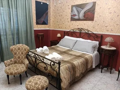 Letto o letti in una camera di Carmelo's Home
