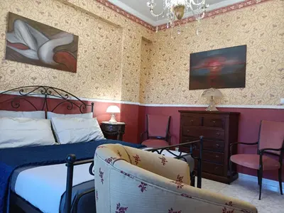 Letto o letti in una camera di Carmelo's Home