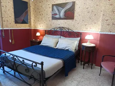 Letto o letti in una camera di Carmelo's Home