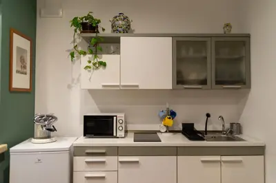 Cucina o angolo cottura di Pasubio Urban Suites