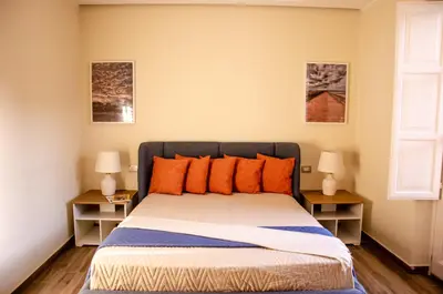 Letto o letti in una camera di Palazzo Fiammingo Rooms