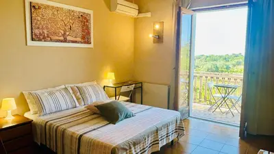 Letto o letti in una camera di Villa Carolea