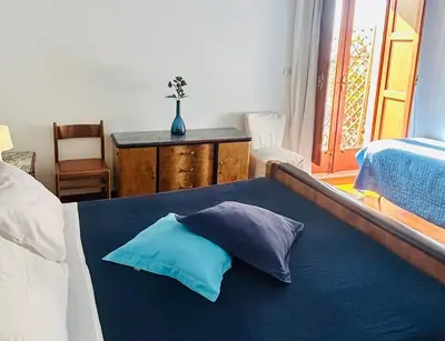 Letto o letti in una camera di Villa Carolea