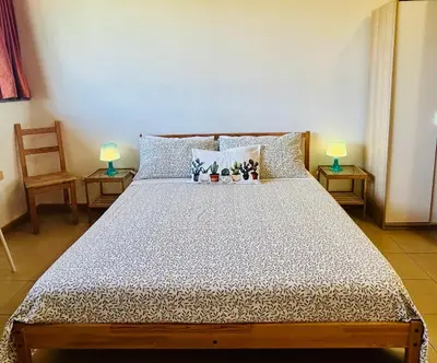 Letto o letti in una camera di Villa Carolea