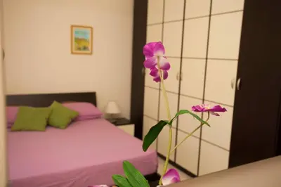 Letto o letti in una camera di Casa Aurelia