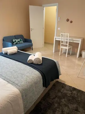 Letto o letti in una camera di Casa Bella