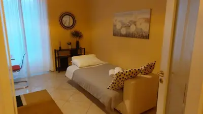Letto o letti in una camera di Casa Bella