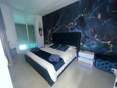 Letto o letti in una camera di 4 Rooms Rosario