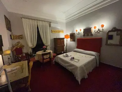 Letto o letti in una camera di La Dimora dell'Imperatore