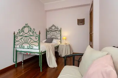 Letto o letti in una camera di Aghi di Pino Holiday by Harmony House