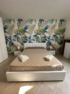 Letto o letti in una camera di Sole e Mare