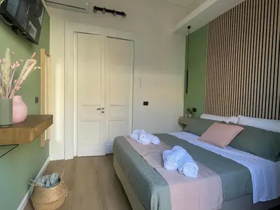 Letto o letti in una camera di Maison Etnea