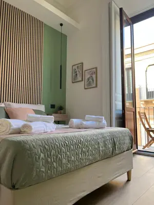 Letto o letti in una camera di Maison Etnea