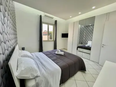 Letto o letti in una camera di Cold River House - Nesima apt