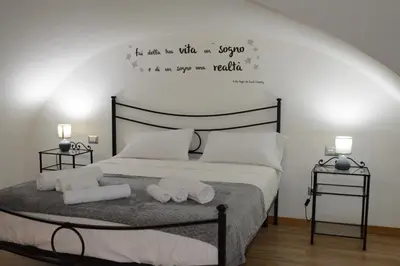 Letto o letti in una camera di Verdi apartment - Historic Centre Catania