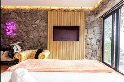 Letto o letti in una camera di Dolce Lava - Luxury LavaStone Suite