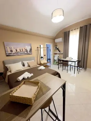 Letto o letti in una camera di Ma Maison Etnea