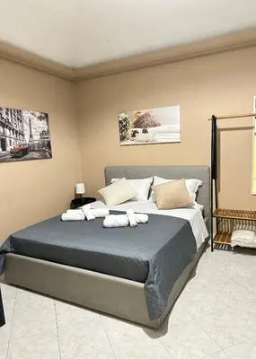 Letto o letti in una camera di Ma Maison Etnea