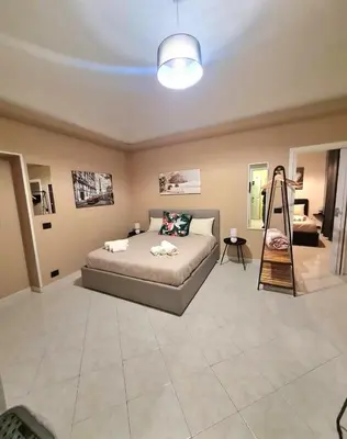 Letto o letti in una camera di Ma Maison Etnea