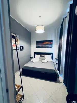 Letto o letti in una camera di Ma Maison Etnea
