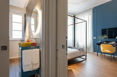 Letto o letti in una camera di Elysium Boutique Apartments - Catania