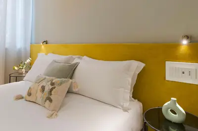 Letto o letti in una camera di Elysium Boutique Apartments - Catania